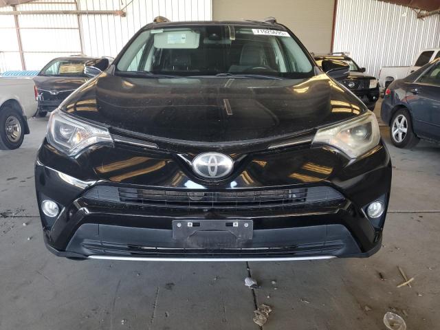 Photo 5 from auction – 2017 TOYOTA RAV4 XLE with VIN 2T3WFREV7HW362514
