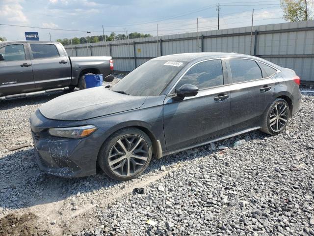 HONDA CIVIC TOURING 2023 with VIN 2HGFE1F97PH302142 - Photo from auction
