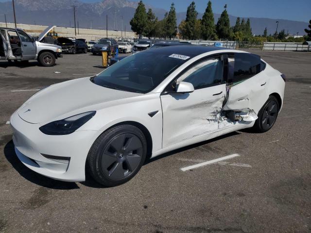 TESLA MODEL 3 2022 with VIN 5YJ3E1EB0NF136832 - Photo from auction