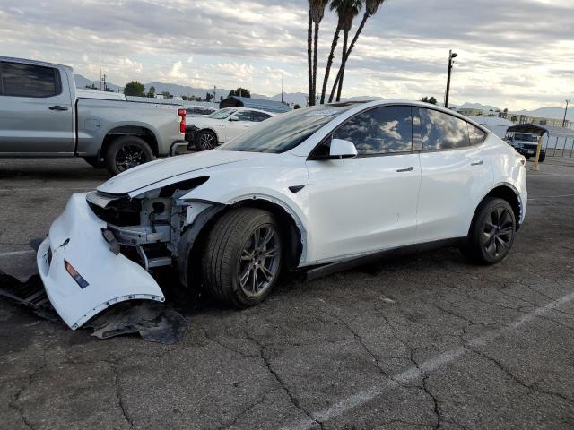 TESLA MODEL Y 2025 with VIN 7SAYGDEE7SF288021 - Photo from auction