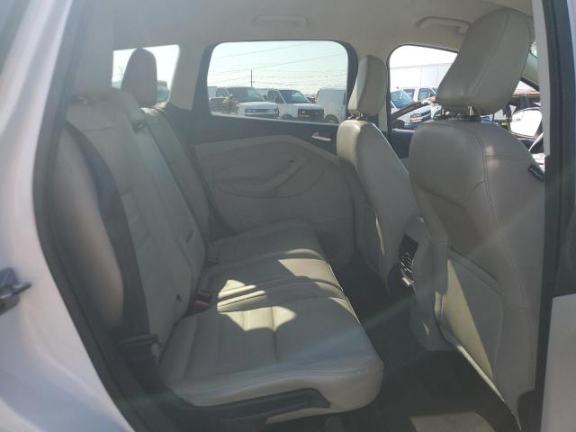 Photo 11 from auction – 2019 FORD ESCAPE TIT with VIN 1FMCU9J93KUA97351