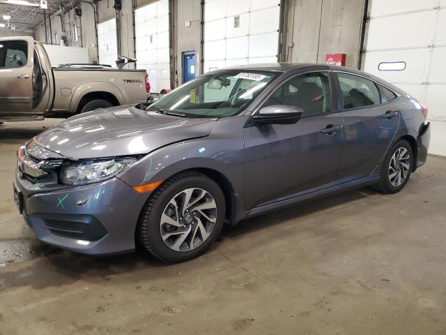 HONDA CIVIC EX 2017 with VIN 19XFC2F72HE070538 - Photo from auction