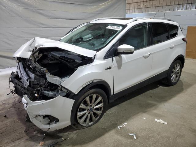 FORD ESCAPE TITANIUM 2017 with VIN 1FMCU9JD1HUD63642 - Photo from auction