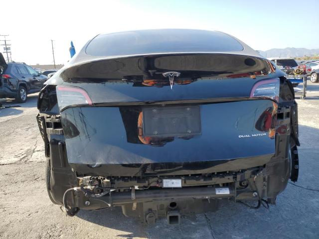 Photo 6 from auction – 2022 TESLA MODEL Y with VIN 7SAYGAEE0NF493974