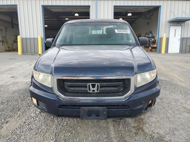 Photo 5 from auction – 2009 HONDA RIDGELINE with VIN 5FPYK16219B100397