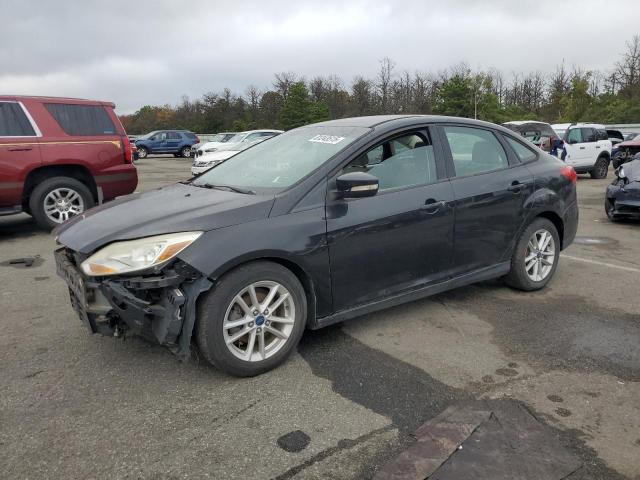 FORD FOCUS SE 2015 with VIN 1FADP3F24FL325528 - Photo from auction