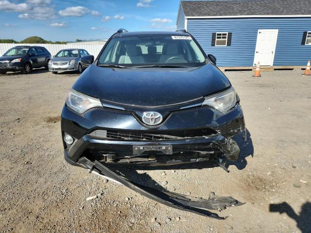 Photo 5 from auction – 2016 TOYOTA RAV4 XLE with VIN 2T3RFREV7GW516098