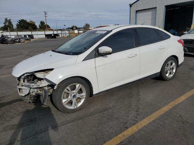 FORD FOCUS SE 2014 with VIN 1FADP3F25EL382383 - Photo from auction
