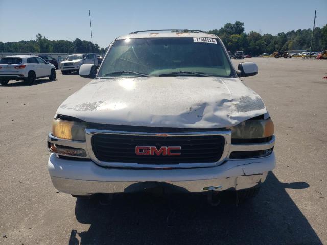 Photo 5 from auction – 2002 GMC YUKON with VIN 1GKEC13Z82J287389