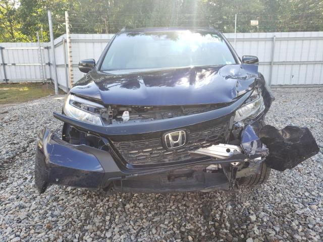 Photo 5 from auction – 2021 HONDA PASSPORT T with VIN 5FNYF8H91MB036080
