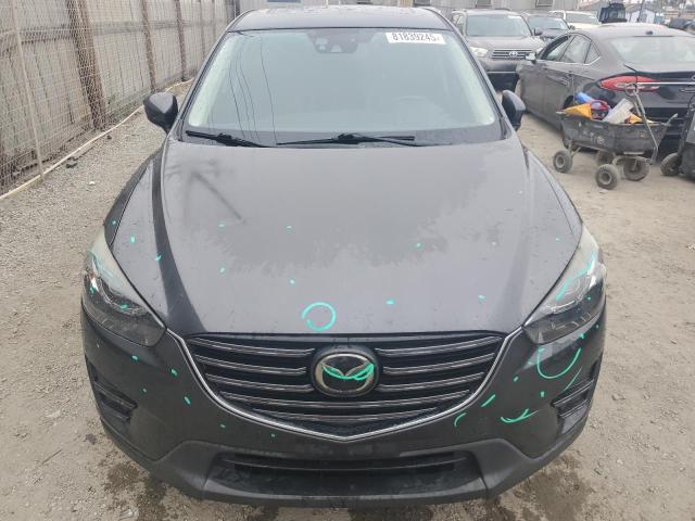 Photo 5 from auction – 2016 MAZDA CX-5 GT with VIN JM3KE2DY6G0883948