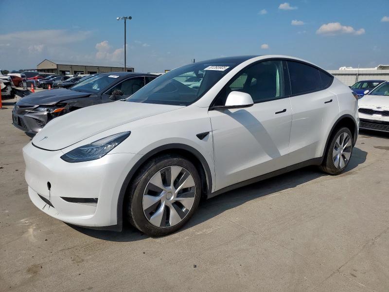 TESLA MODEL Y 2023 with VIN 7SAYGDEE9PA088942 - Photo from auction