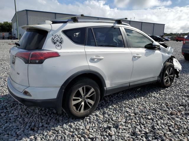Photo 3 from auction – 2017 TOYOTA RAV4 XLE with VIN JTMWFREV7HD097574