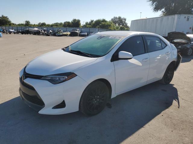 TOYOTA COROLLA L 2018 with VIN 5YFBURHE5JP831597 - Photo from auction