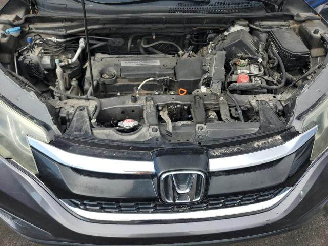 Photo 11 from auction – 2015 HONDA CR-V LX with VIN 3CZRM3H33FG702260