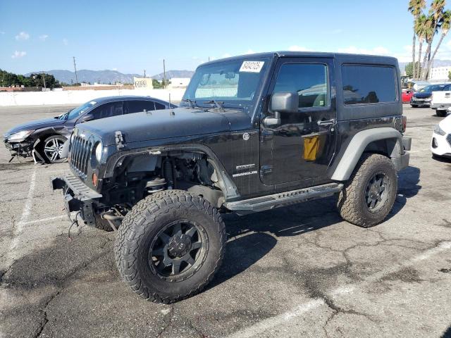 JEEP WRANGLER SPORT 2011 with VIN 1J4AA2D13BL511360 - Photo from auction