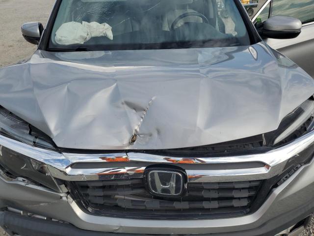 Photo 11 from auction – 2020 HONDA RIDGELINE with VIN 5FPYK3F77LB014347