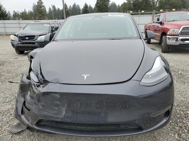 Photo 5 from auction – 2025 TESLA MODEL Y with VIN 7SAYGDEE4SF235566