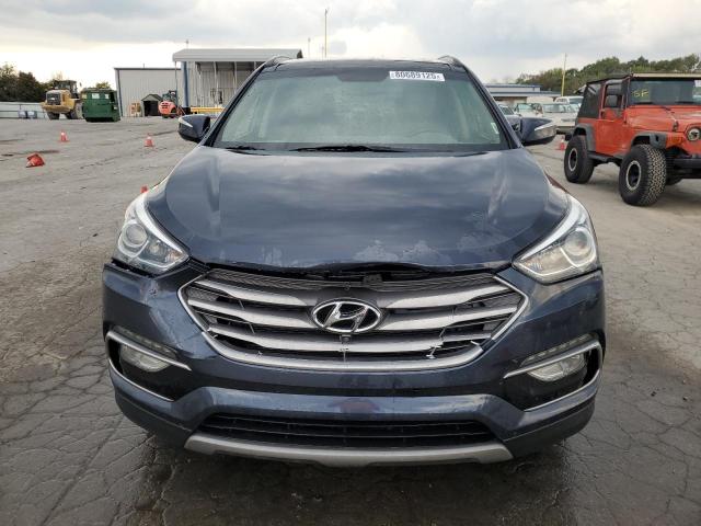 Photo 5 from auction – 2017 HYUNDAI SANTA FE S with VIN 5NMZU3LB5HH041844