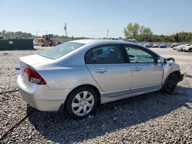 Photo 3 from auction – 2011 HONDA CIVIC LX with VIN 19XFA1F53BE045217