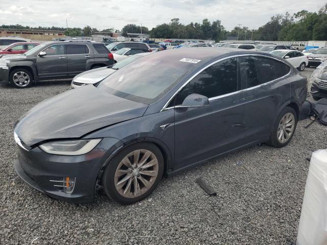 TESLA MODEL X 2018 with VIN 5YJXCDE28JF114144 - Photo from auction