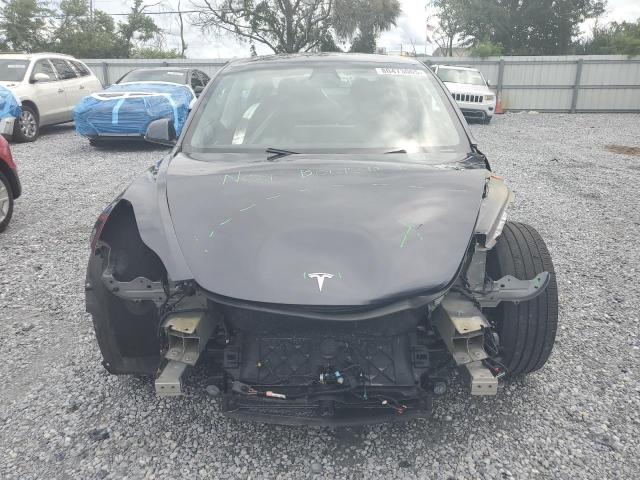 Photo 5 from auction – 2021 TESLA MODEL 3 with VIN 5YJ3E1EBXMF032668