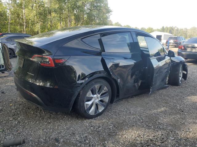 Photo 3 from auction – 2023 TESLA MODEL Y with VIN LRWYGDEE3PC105227