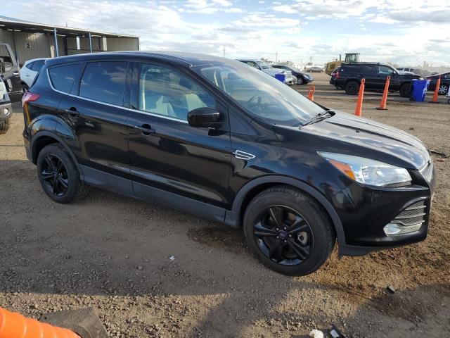 Photo 4 from auction – 2016 FORD ESCAPE SE with VIN 1FMCU9GX3GUA67215