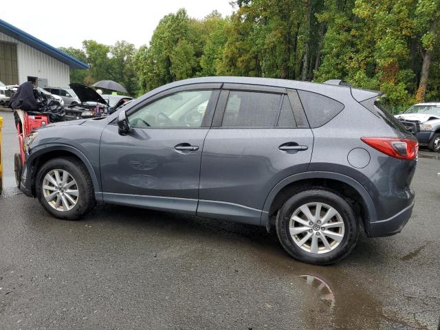 Photo 2 from auction – 2014 MAZDA CX-5 TOURING with VIN JM3KE4CY0E0408337