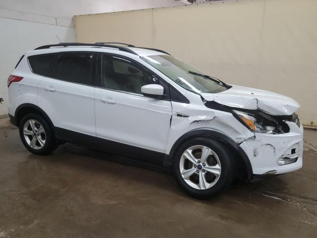 Photo 4 from auction – 2014 FORD ESCAPE SE with VIN 1FMCU9G94EUB97308