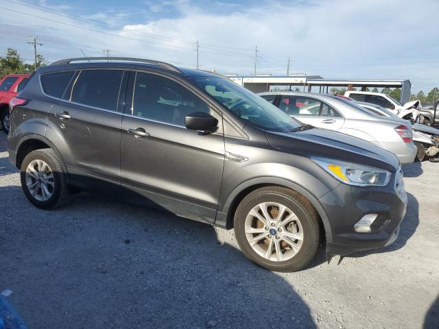 Photo 4 from auction – 2018 FORD ESCAPE SE with VIN 1FMCU0GD5JUC55291