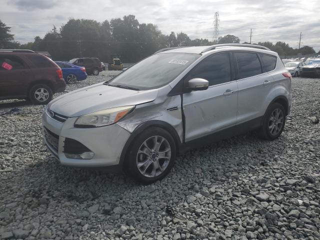 FORD ESCAPE TIT 2014 with VIN 1FMCU0JX3EUB49513 - Photo from auction