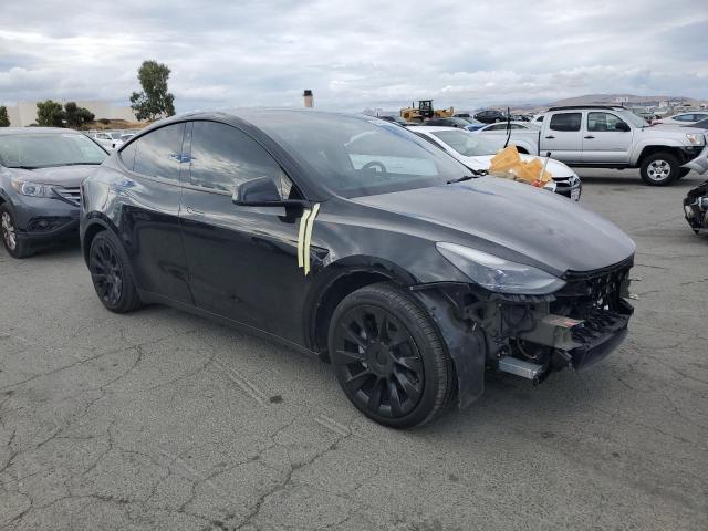 Photo 4 from auction – 2023 TESLA MODEL Y with VIN 7SAYGAEE9PF715124