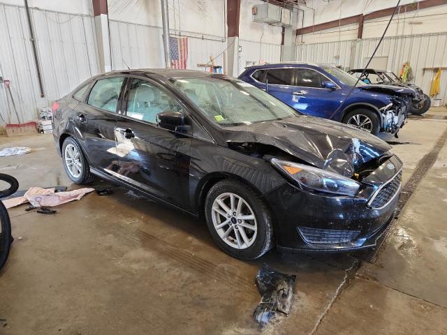 Photo 4 from auction – 2016 FORD FOCUS SE with VIN 1FADP3F22GL313461