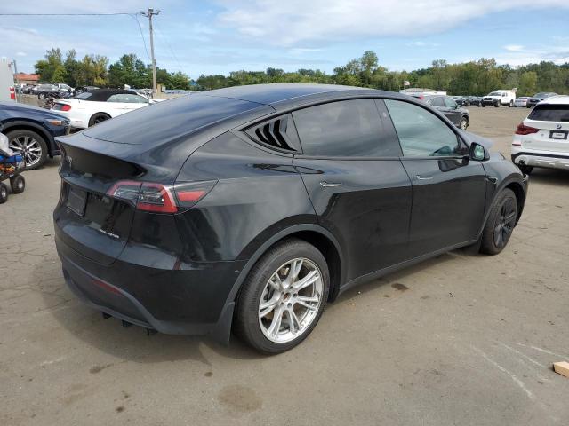 Foto 3 de la subasta – 2023 TESLA MODEL Y con VIN 7SAYGAEE6PF860007