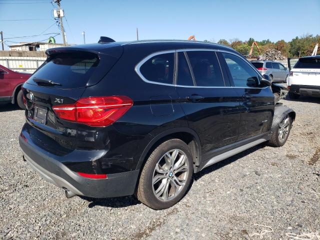 Photo 3 from auction – 2017 BMW X1 XDRIVE2 with VIN WBXHT3Z35H4A64957