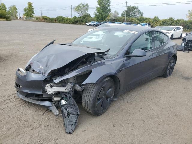 TESLA MODEL 3 2023 with VIN LRW3E1EB1PC921969 - Photo from auction