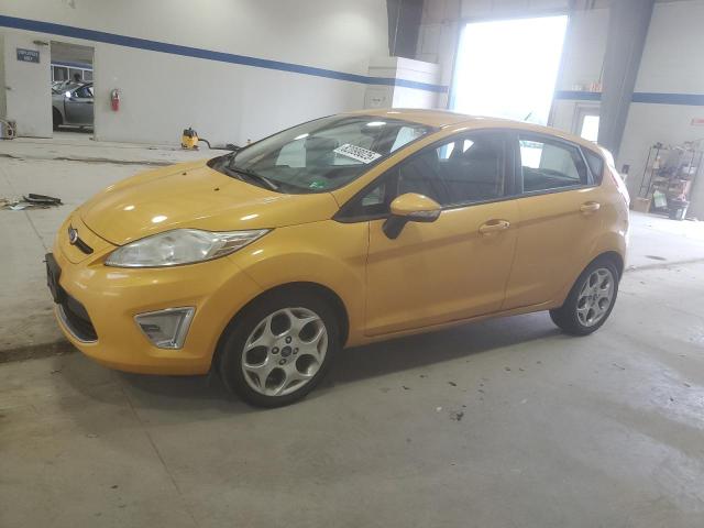 FORD FIESTA SES 2011 with VIN 3FADP4FJ6BM223041 - Photo from auction