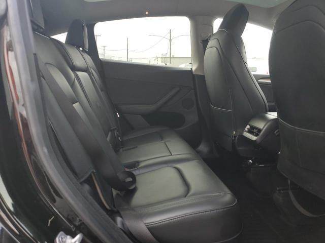 Photo 11 from auction – 2023 TESLA MODEL Y with VIN 7SAYGDEE4PA184090
