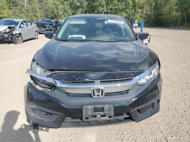 Photo 5 from auction – 2018 HONDA CIVIC LX with VIN 2HGFC2F68JH010671