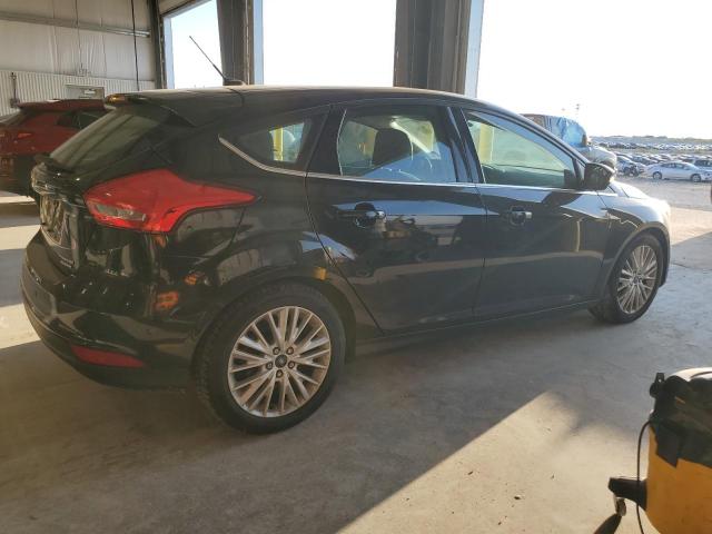 Photo 3 from auction – 2015 FORD FOCUS TITA with VIN 1FADP3N24FL305958