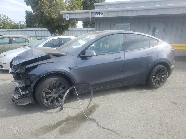 TESLA MODEL Y 2022 with VIN 7SAYGAEE2NF536338 - Photo from auction