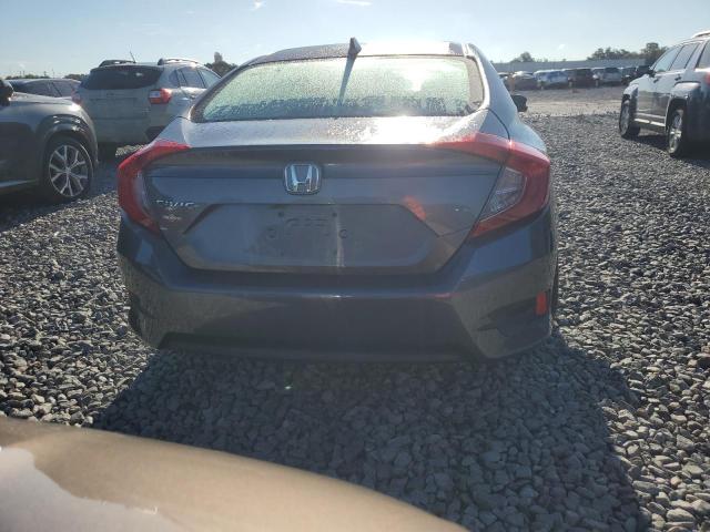 Photo 6 from auction – 2017 HONDA CIVIC EX with VIN 19XFC2F74HE003505