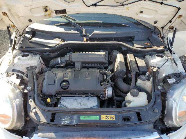 Photo 11 from auction – 2009 MINI COOPER with VIN WMWMF33569TT69396