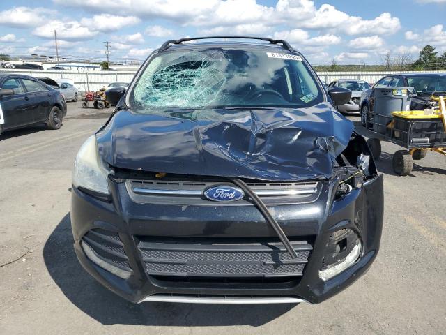 Photo 5 from auction – 2015 FORD ESCAPE SE with VIN 1FMCU9GX1FUC10273