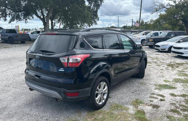 Photo 4 from auction – 2018 FORD ESCAPE SE with VIN 1FMCU0GD0JUB04763