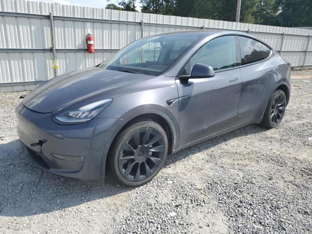 TESLA MODEL Y 2022 with VIN 7SAYGDEE3NA006569 - Photo from auction