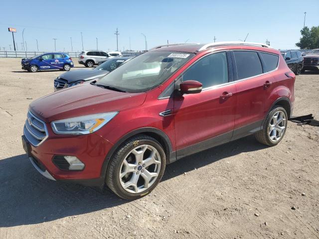 FORD ESCAPE TITANIUM 2019 with VIN 1FMCU9J99KUA19012 - Photo from auction