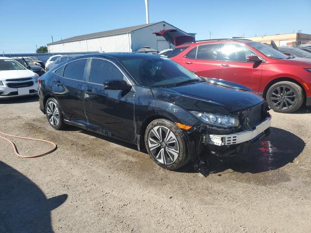 Photo 4 from auction – 2018 HONDA CIVIC EX with VIN 2HGFC1F40JH104147