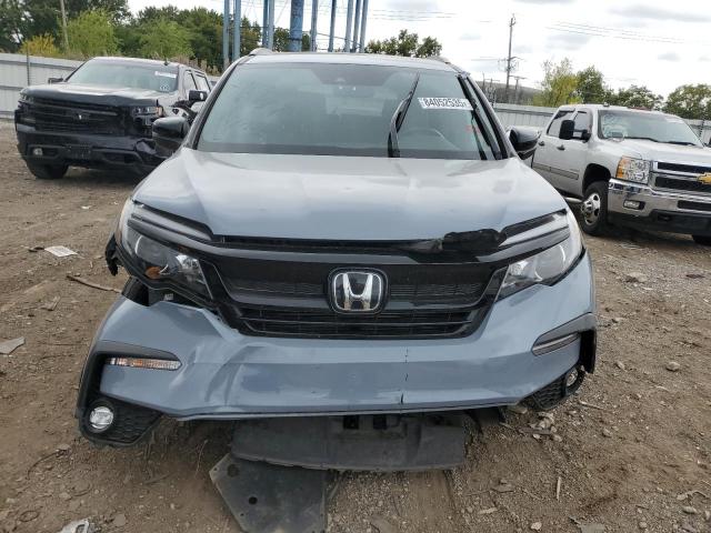 Photo 5 from auction – 2022 HONDA PILOT TRAI with VIN 5FNYF6H89NB081300